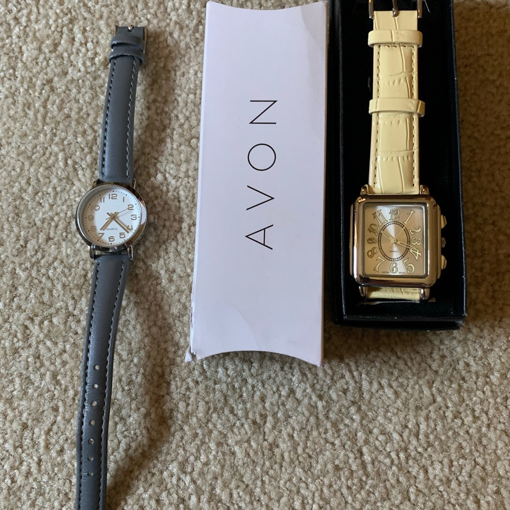 2 Avon Watches. Yellow 1 Never Out of Box. Gray 1 Wore Few Times. $10.00 Pair.